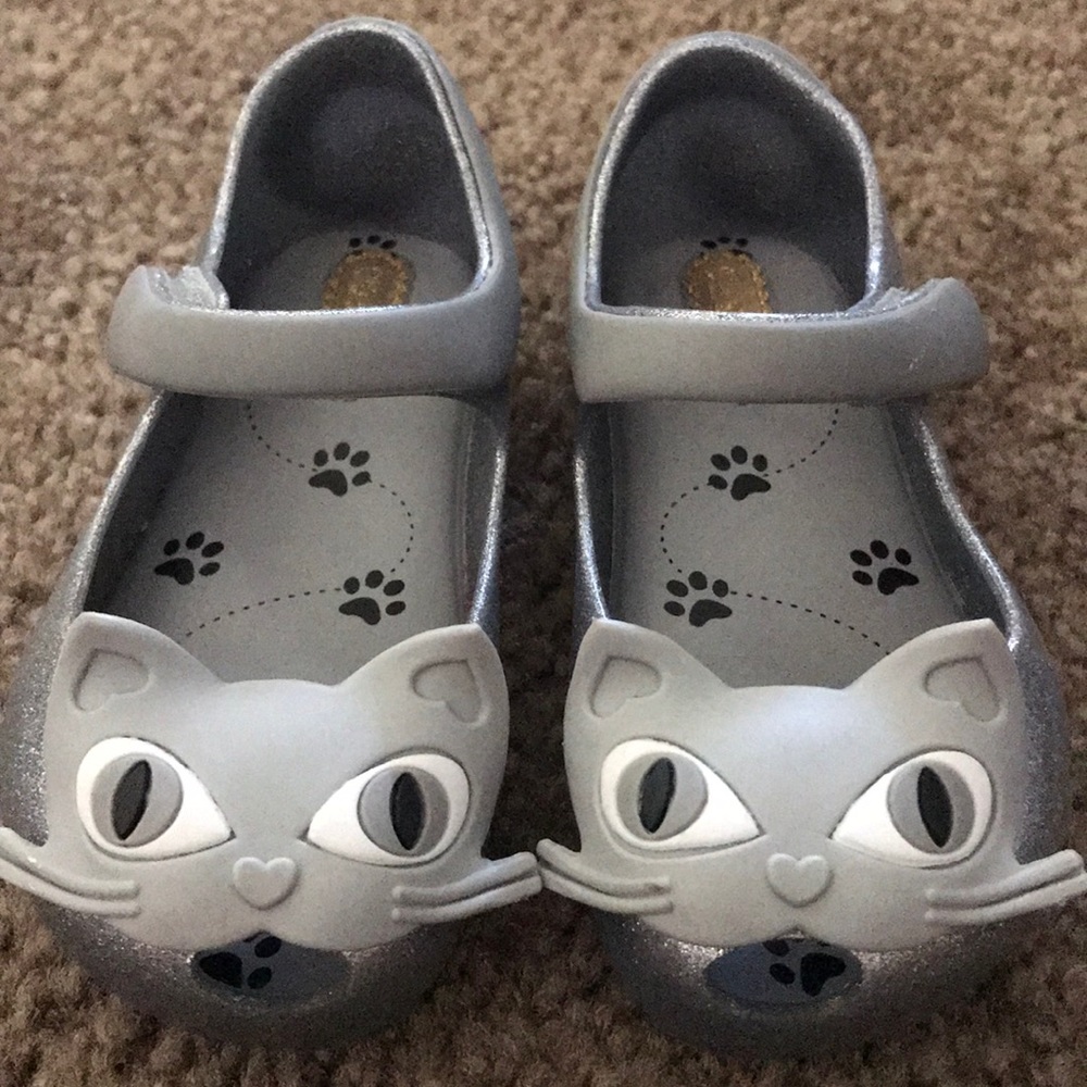 NEW Mini Melissa silver cat shoes.